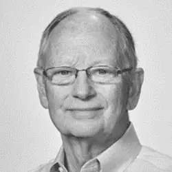 A black and white photo of an older man.